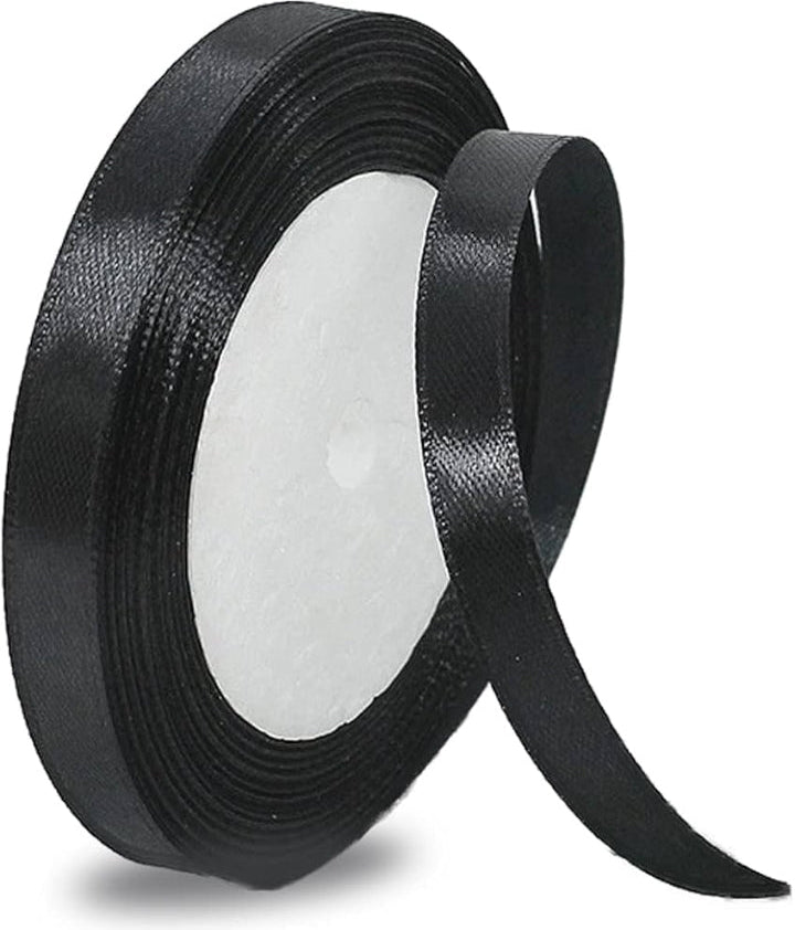 Black ribbon roll on a white background