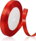 Red ribbon roll on a white background