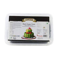 Packaged black sugar paste with a cake illustration on the label, brand 'Vizyon' visible.