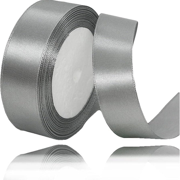 Silver ribbon roll on a white background