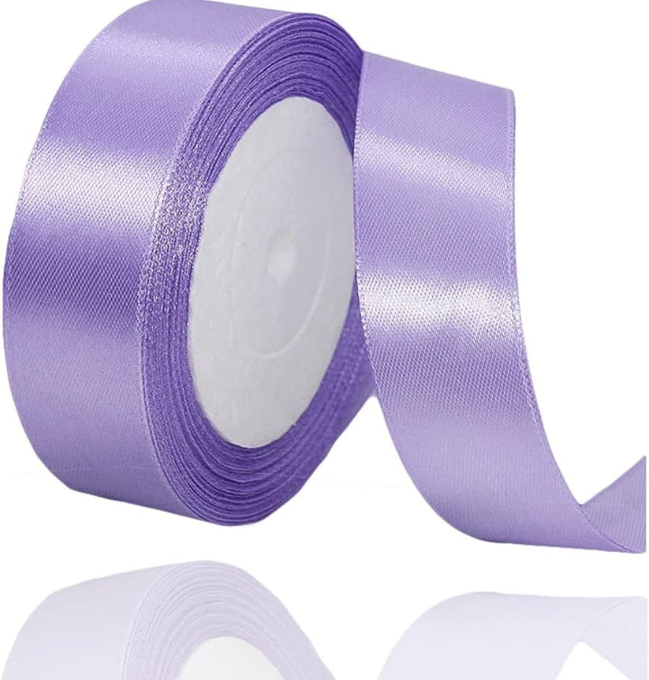 Roll of purple ribbon with text indicating length on a white background