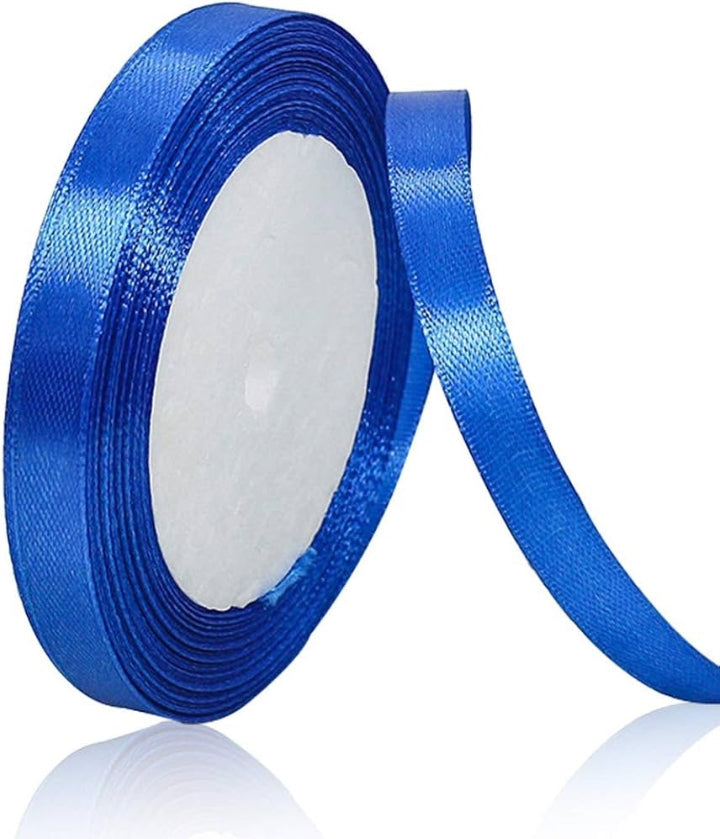 Blue ribbon roll with a white core on a black background